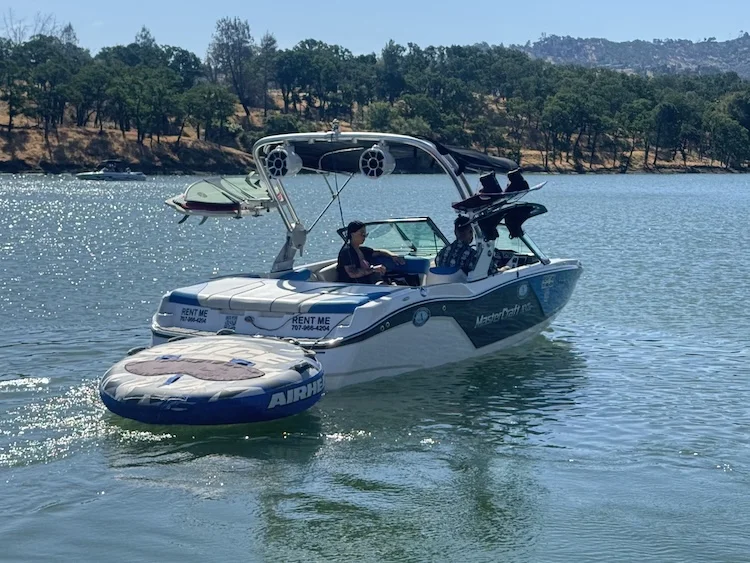Mastercraft NXT-20Surf Boat on Lake Berryessa. pulling tube